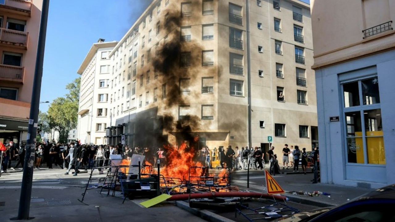 A fire in Lyon during a protest, October 6, 2026. REUTERS