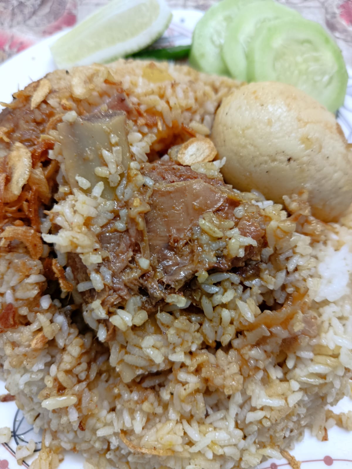 চিনিগুঁড়া চালের কাচ্চি বিরিয়ানি। ছবি: চরচা